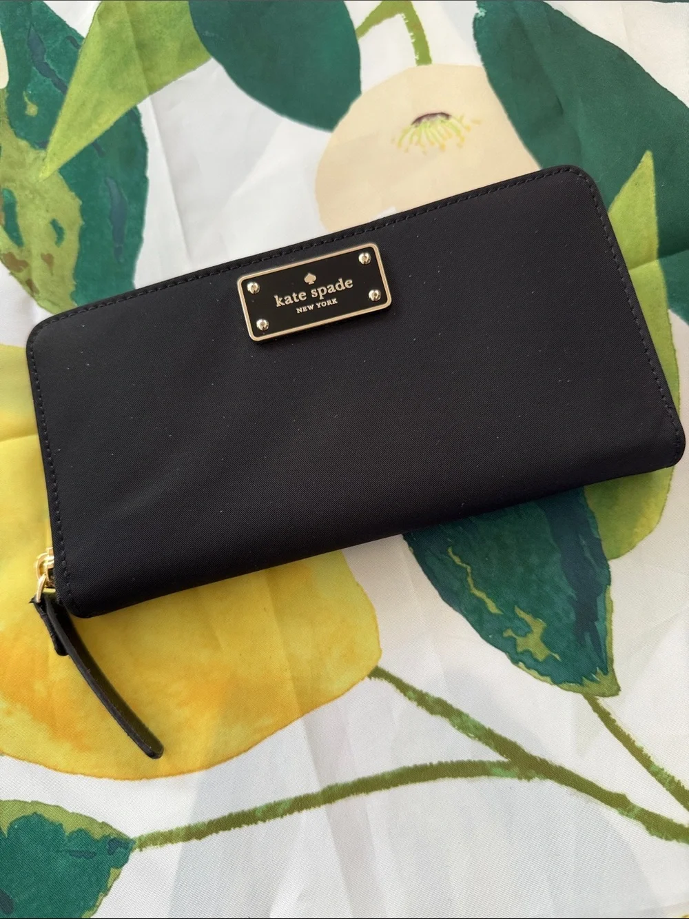 kate spade black zip-around wallet with gold plaque